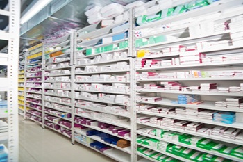 Medicines Arranged In Shelves At Drugstore